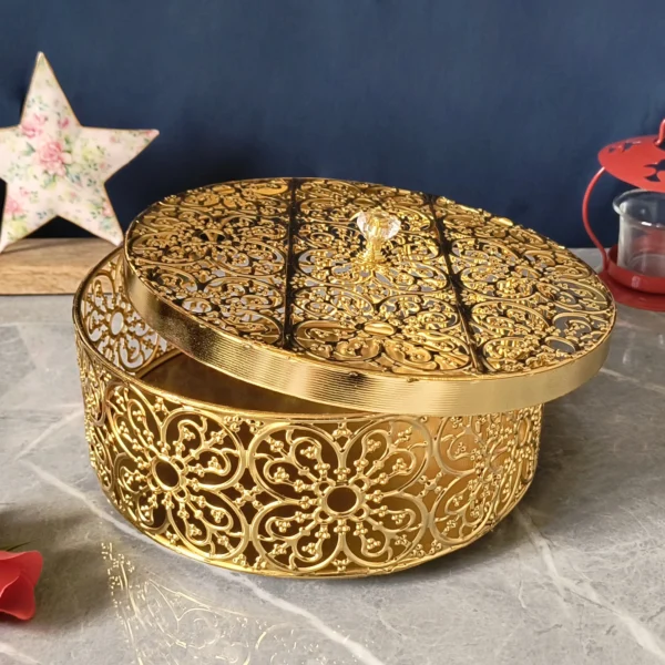 Round decorative box with golden finish, perfect Diwali gift hamper packaging for dry fruits and sweets
