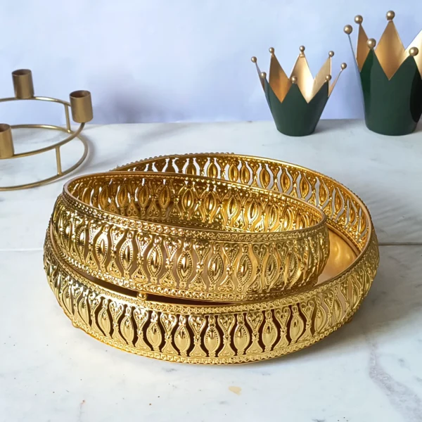 Round golden serving tray set of 2 with decorative border design